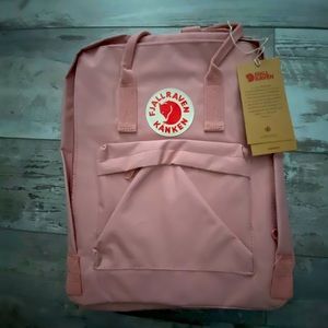 Fjallraven Kanken light pink back pack new with tags never been used.
